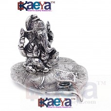 OkaeYa Silver Finish Ganesh Sitting on Leaf With Diya God Idol With Beautiful Velvet Box 